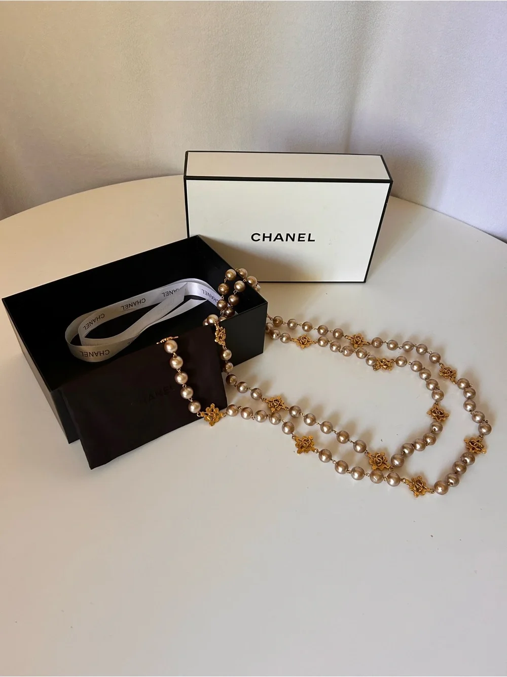 Vintage CHANEL Extra Long Rare Gold and Champagne Pearl CC Monogram Necklace